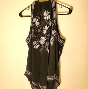 Black sleeveless shirt with silver flowers